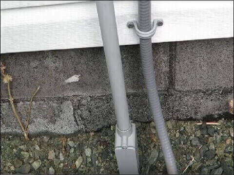 Swimming Pool Electrician exterior electrical pipes in Pierrefonds, West Island